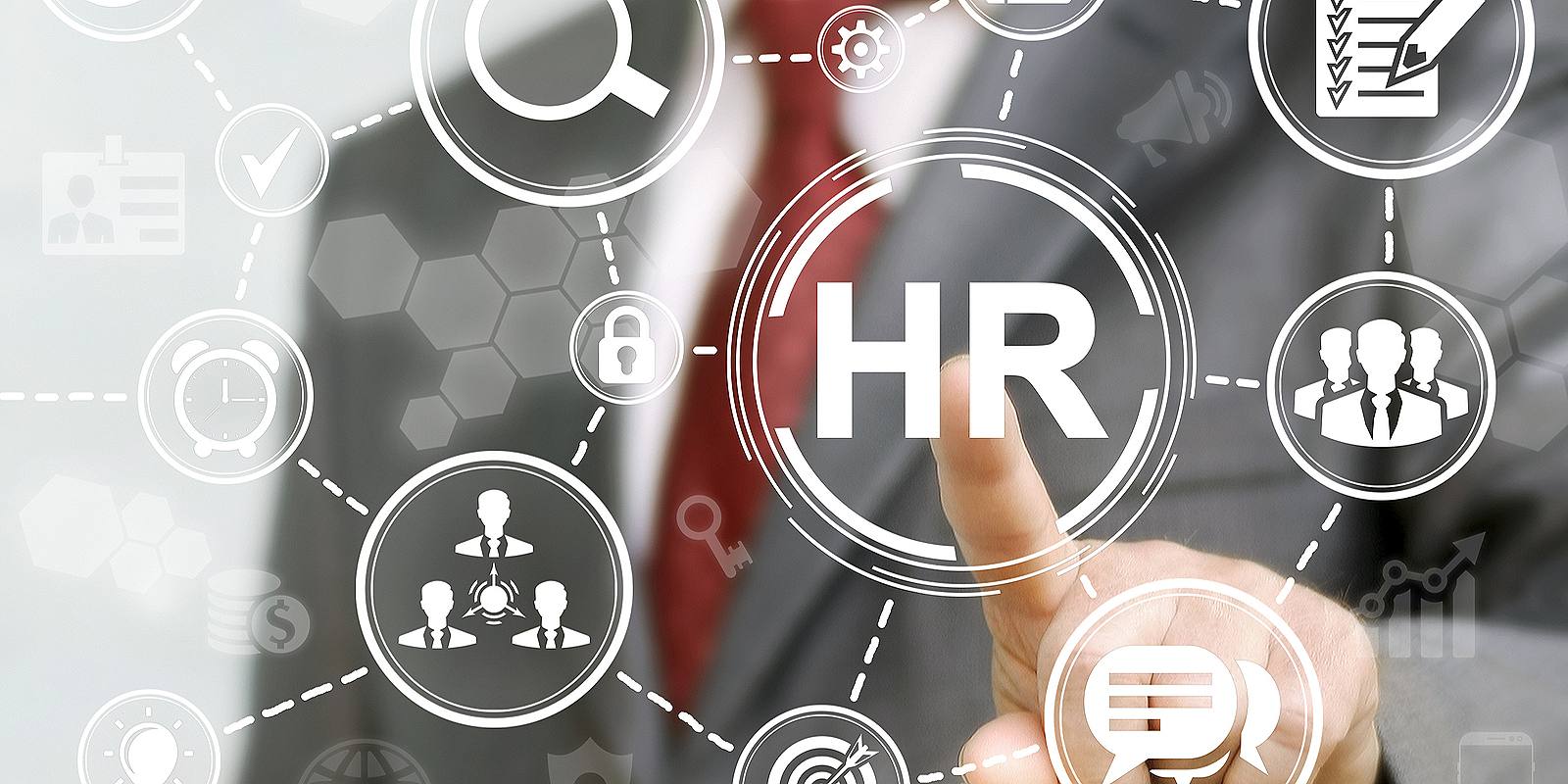 HR professional presses HR icon on a virtual screen a concept of what HR solutions are