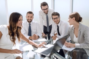 Experienced workers discussing health insurance compliance