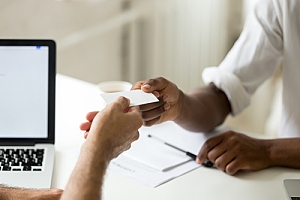 Insurance consultant providing references to a client