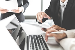 Business employees on computer 