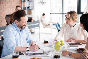 employees-smiling-about-self-funded-insurance