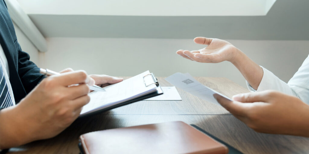 Insurance consultant at desk